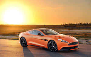 Sleek Aston Martin Vanquish In Motion Wallpaper