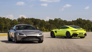 Sleek Aston Martin Vantage On The Road Wallpaper