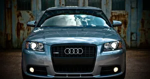 Sleek Audi A3 In A Majestic Landscape Wallpaper