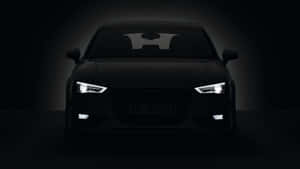 Sleek Audi A3 On A Scenic Road Wallpaper