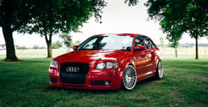 Sleek Audi A3 On The Road Wallpaper