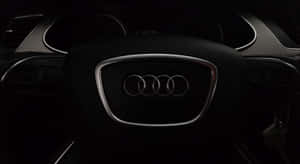 Sleek Audi A4 In A Night Cityscape Wallpaper