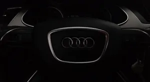 Sleek Audi A4 In A Night Cityscape Wallpaper