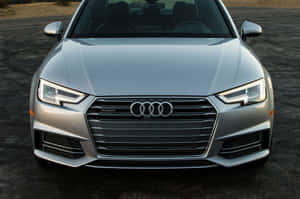 Sleek Audi A4 In Motion Wallpaper