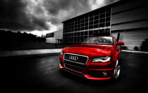 Sleek Audi A4 In Open Road Wallpaper