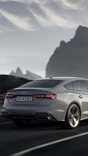 Sleek Audi A5 Sportback In Motion Wallpaper