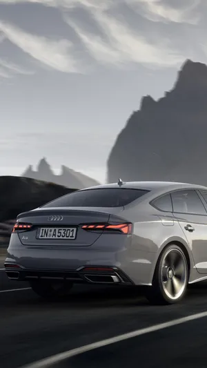 Sleek Audi A5 Sportback In Motion Wallpaper