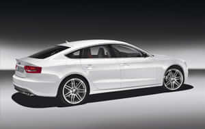 Sleek Audi A5 Sports Car In Action Wallpaper