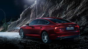 Sleek Audi A5 Under The City Lights Wallpaper