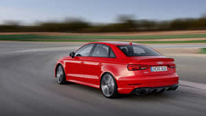 Sleek Audi Rs3 In Motion Wallpaper