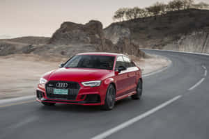 Sleek Audi Rs3 On An Open Road Wallpaper