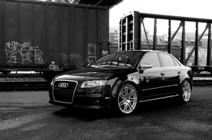 Sleek Audi Rs4 In Dynamic Action Wallpaper