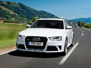 Sleek Audi Rs5 Coupe In Action Wallpaper