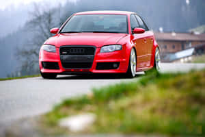 Sleek Audi Rs5 Parked In The City Wallpaper