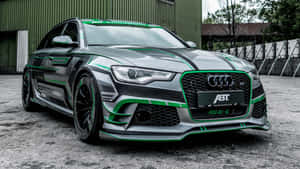 Sleek Audi Rs6 Captured In Motion Wallpaper