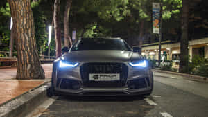 Sleek Audi Rs6 In Motion Wallpaper