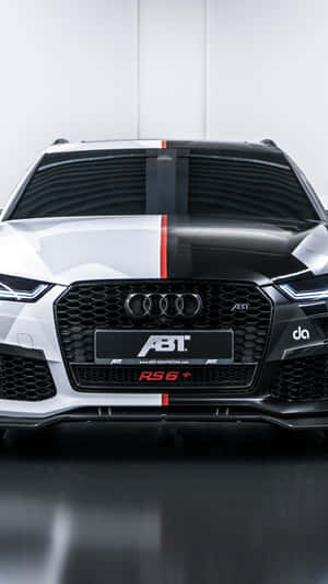 Sleek Audi Rs6 In Motion Wallpaper