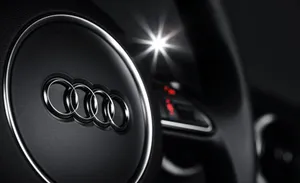 Sleek Audi S3 In Red On Open Road Wallpaper