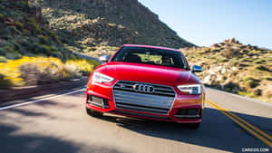 Sleek Audi S4 In Motion Wallpaper