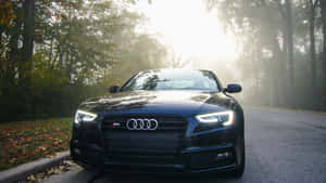 Sleek Audi S4 In Motion Wallpaper