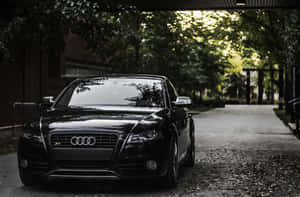 Sleek Audi S4 In Urban Environment Wallpaper