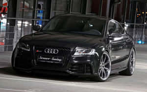 Sleek Audi S4 On Urban Streets Wallpaper