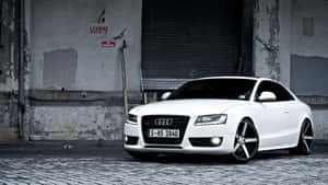 Sleek Audi S5 In Breathtaking Scenery Wallpaper