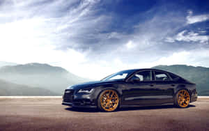 Sleek Audi S7 In Motion Wallpaper