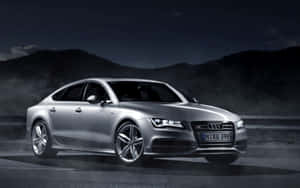 Sleek Audi S7 In Motion Wallpaper