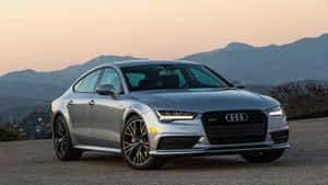 Sleek Audi S7 On A Stunning Vista Wallpaper