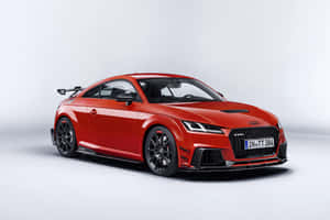 Sleek Audi Tt Rs In Motion Wallpaper