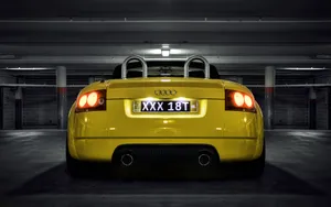 Sleek Audi Tt Sports Car In Action Wallpaper