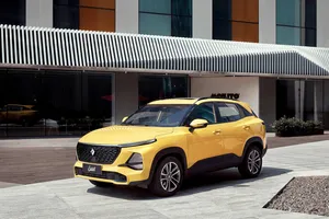 Sleek Baojun Car On The Road Wallpaper