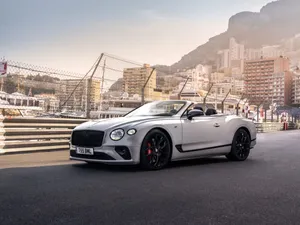 Sleek Bentley Continental Gt In An Urban Backdrop. Wallpaper