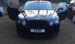 Sleek Bentley Continental Supersports In Motion Wallpaper