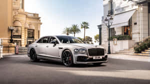 Sleek Bentley Mulsanne Cruising On The Road Wallpaper