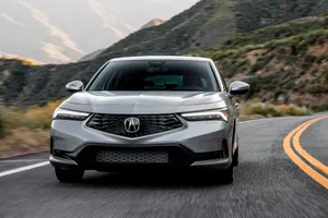 Sleek Black Acura Integra On Display Wallpaper