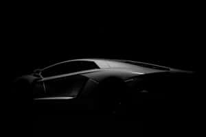 Sleek Black And White Sports Car Wallpaper