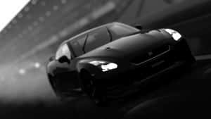 Sleek Black And White Sports Car Wallpaper