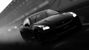 Sleek Black And White Sports Car Wallpaper