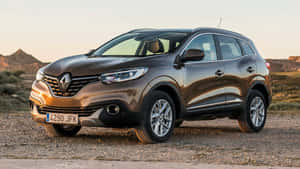 Sleek Black Renault Kadjar On A Misty Mountain Road Wallpaper