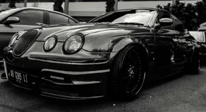 Sleek_ Black_ Sports_ Car_ Monochrome Wallpaper