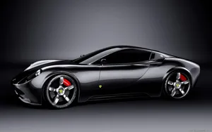 Sleek Black Sports Car Studio Shot Wallpaper