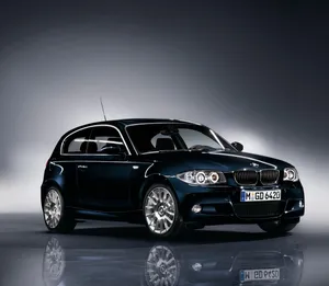 Sleek Bmw 1 Series In Action Wallpaper