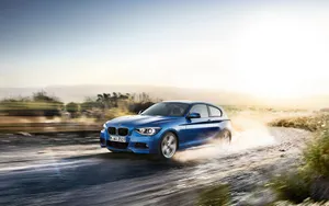 Sleek Bmw 1 Series In Action Wallpaper