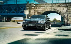 Sleek Bmw 1 Series In Motion Wallpaper