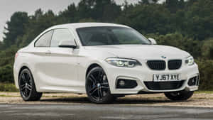 Sleek Bmw 2 Series In Motion Wallpaper