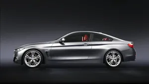 Sleek Bmw 4 Series In Action Wallpaper