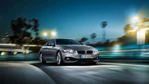 Sleek Bmw 4 Series In Action Wallpaper