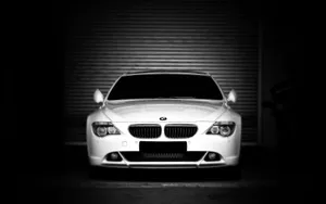 Sleek Bmw 6 Series In An Urban Setting Wallpaper